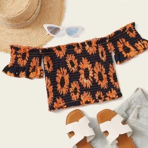 Floral print shirred off shoulder top.